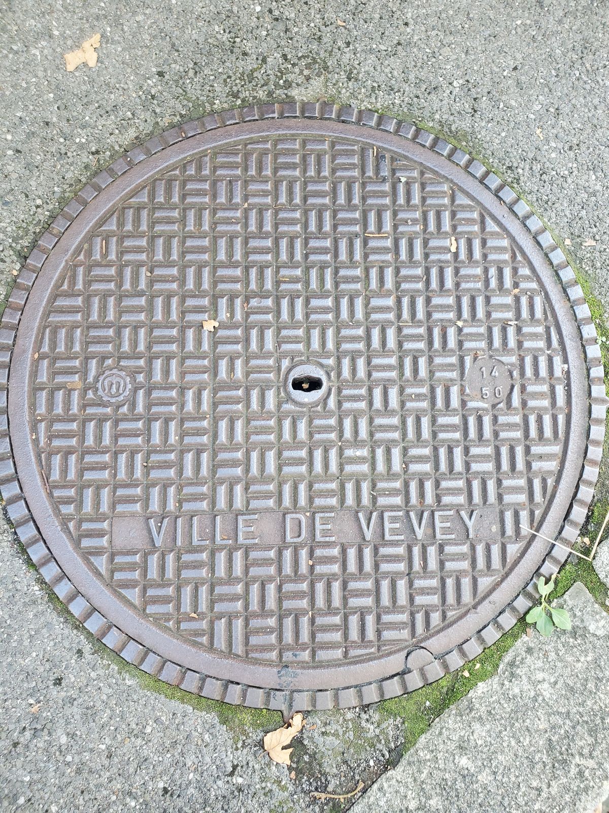 Vevey manhole sign